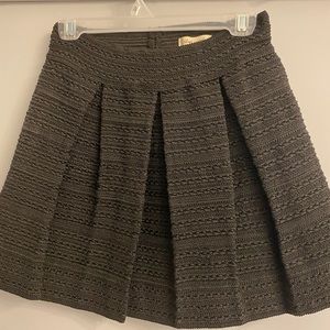 Black textured skirt. Never worn. Thick fabric Size medium